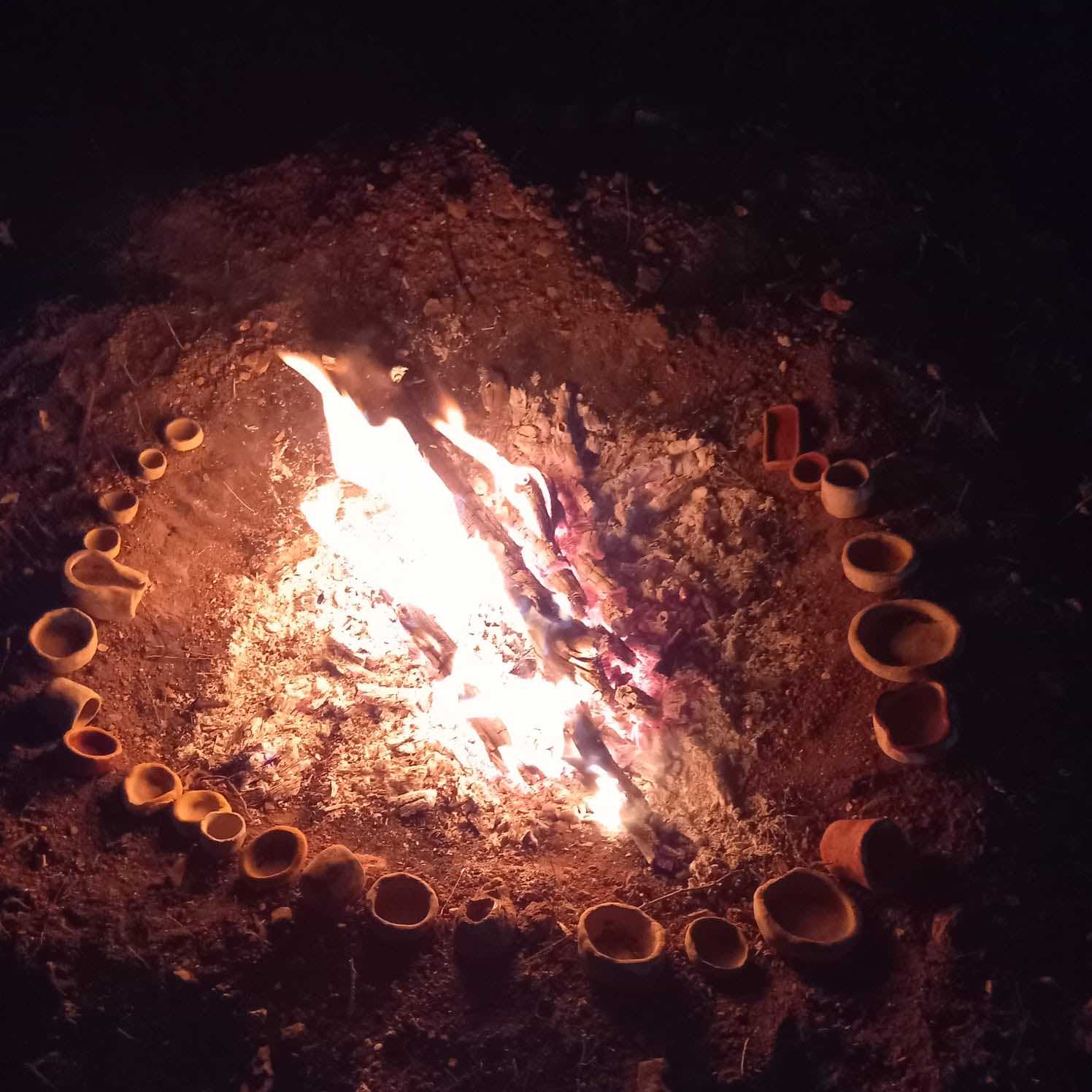 clay pots around the fire